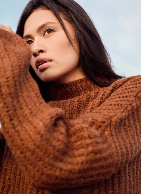 beautiful-asian-brunette-girl-in-cozy-knitted-JXDH6Q7.jpg