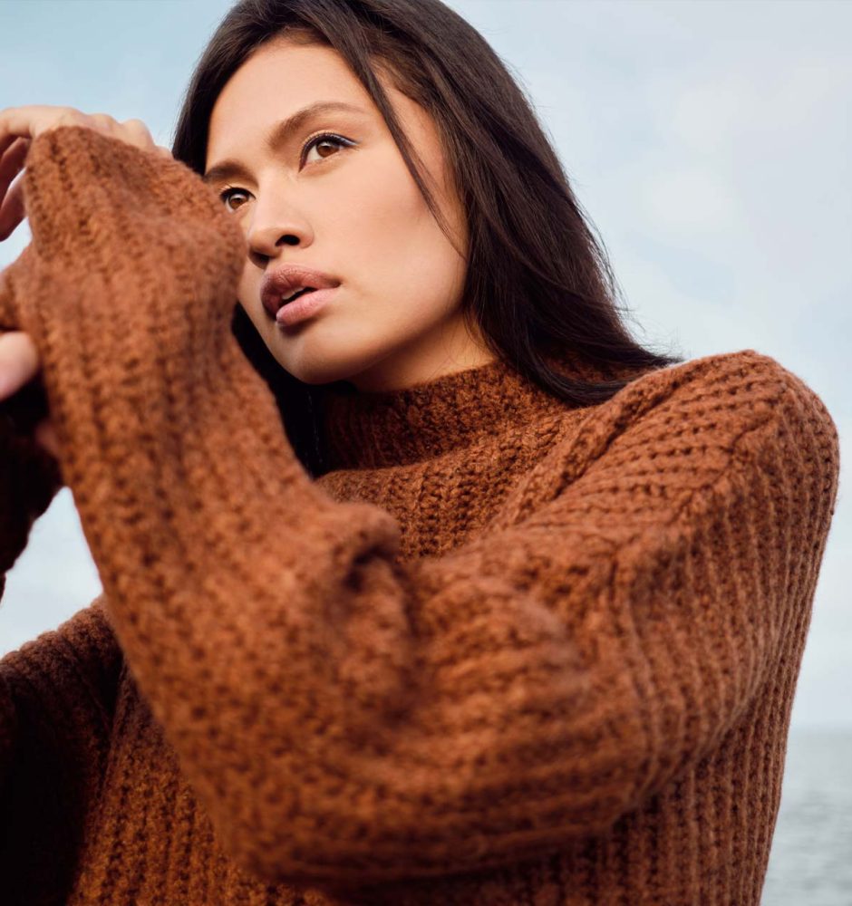beautiful-asian-brunette-girl-in-cozy-knitted-JXDH6Q7.jpg